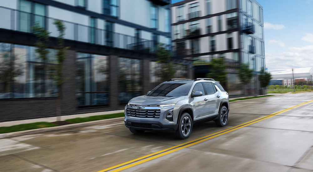 A silver 2025 Chevy Equinox for sale is shown from the front at an angle.