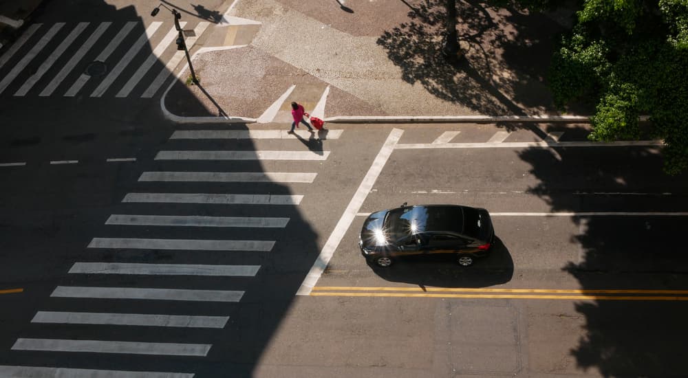 Car stopped at a crosswalk