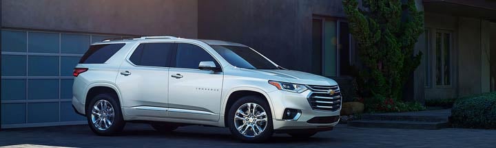 A silver Chevy Traverse.