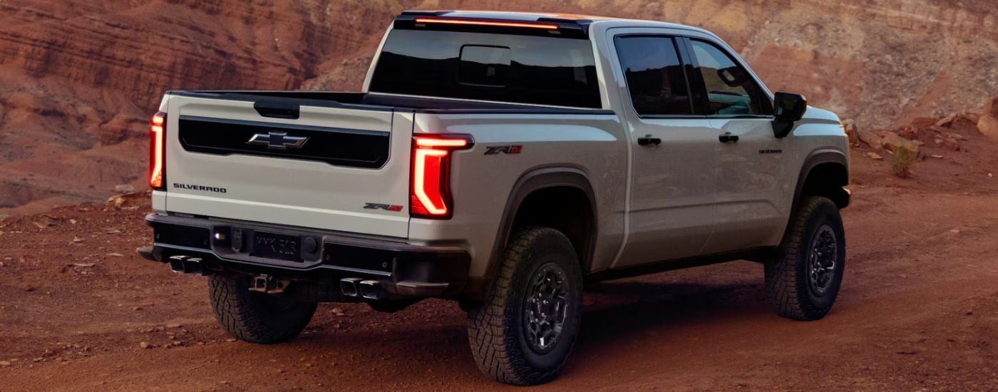 White 2027 Chevy Silverado 1500 ZR2 parked in a canyon