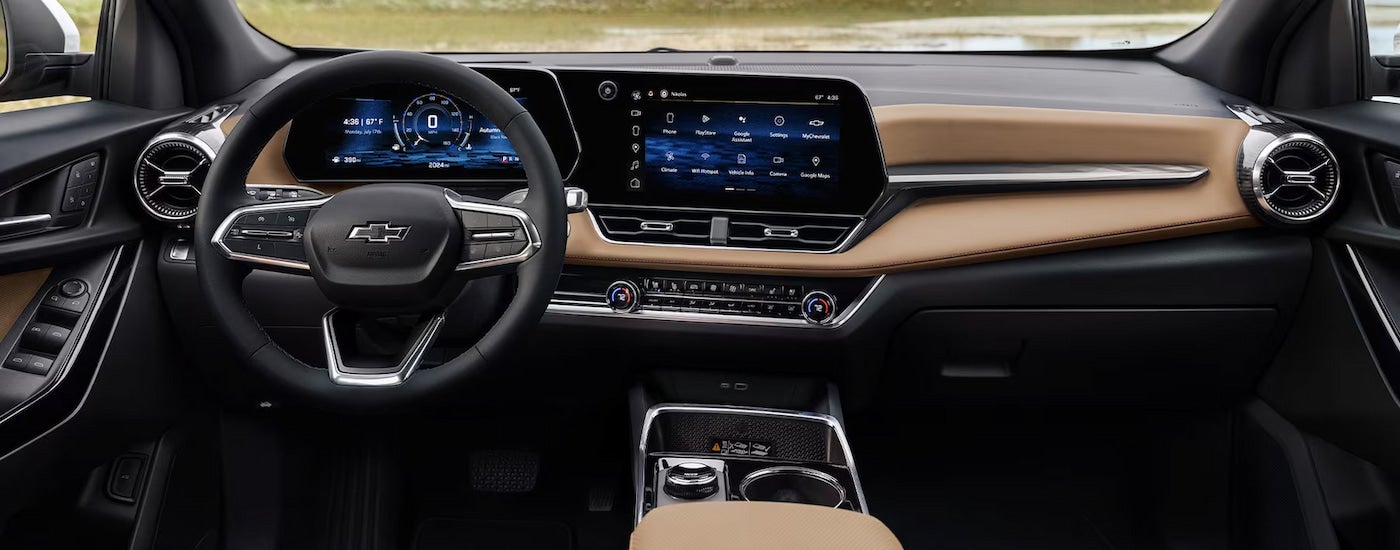 The tan leather interior of a 2025 Chevy Equinox ACTIV for sale.