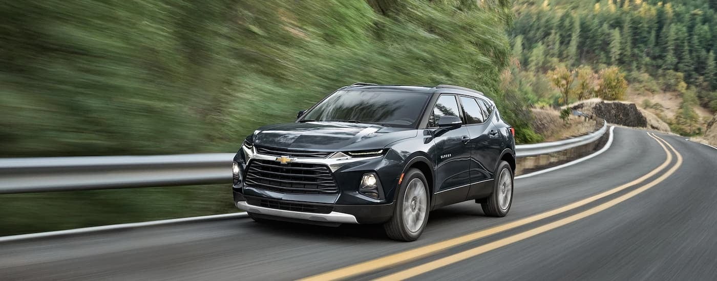 Black 2022 Chevy Blazer driving on an open road